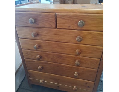 Timber style chest of drawers with 7 drawers. Wick...