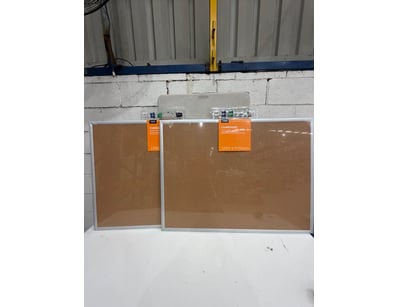 Two cork bulletin boards with aluminium frames. Bo...