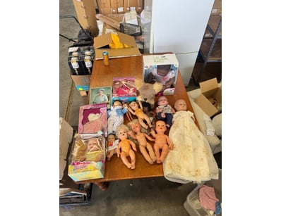 Extensive doll collection featuring dolls from var...