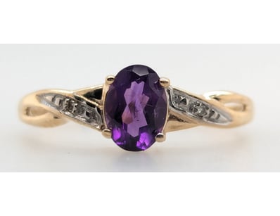 9CT YELLOW GOLD AMETHYST AND DIAMOND RING


583...
