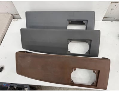 Lot of three automotive sun visors in varying cond...