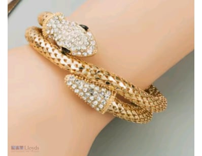 GOLD COLOR SNAKE WRAP BRACELET        

Condition:...