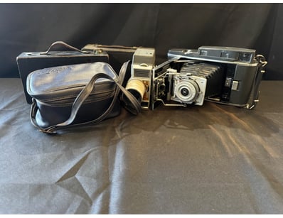 FOLDING CAMERA COLLECTION WITH ACCESSORIES

Item...