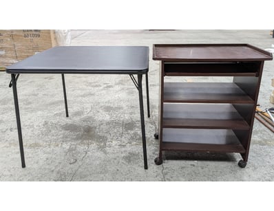 Lot includes a black folding utility table with me...