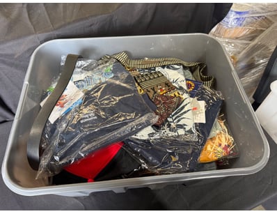 Assorted box of shirts is various sizes and design...