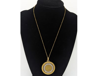 GOLD PLATED AND 500 LIRE PENDANT


583010+159
...