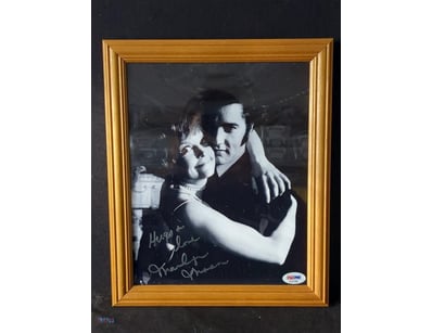AUTOGRAPHED PHOTOGRAPH OF MARILYN MANSON.

Item Si...