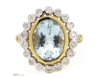 14K YELLOW GOLD, AQUAMARINE AND DIAMOND, HALO RING...