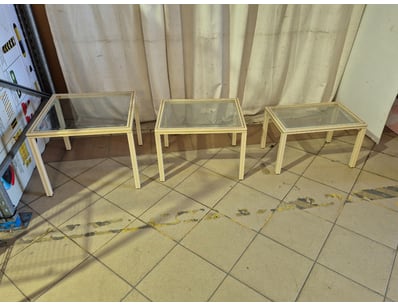 Set of three nesting tables, cream and gold finish...