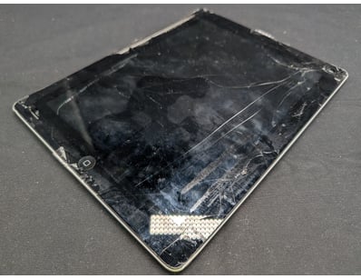 iPad Model A1460 with severely damaged display. Sc...