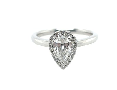 PLATINUM DIAMOND RING

Featuring Centre Pear Brill...