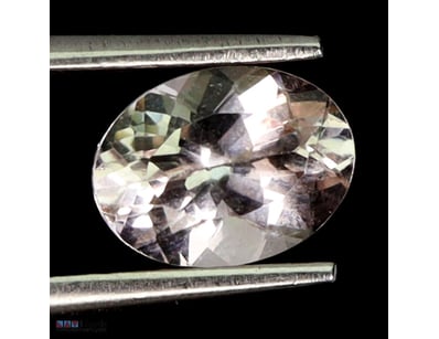 NATURAL 1.25CTCT OVAL FACET PEACHY MORGANITE     
...
