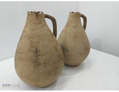 Pair of terracotta juglets  41cmH x 30cmW, with pi...