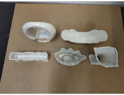 COLLECTION OF SIX WHITE PORCELAIN DECORATIVE VESSE...