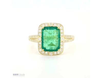 9CT YELLOW GOLD COLOMBIAN EMERALD AND DIAMOND HALO...
