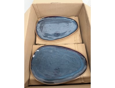 Set of Blue Ceramic Plates, The Box Contains Appro...