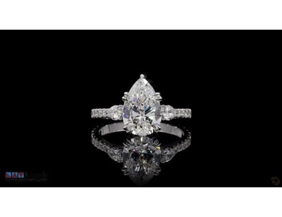 3.22 CT PEAR THREE-STONE RING IN 18KT WHITE GOLD 
...