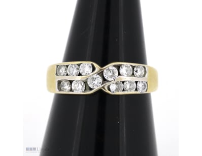 18K YELLOW GOLD AND DIAMOND, DRESS RING.      

Th...