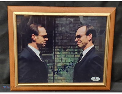 AUTOGRAPHED PHOTOGRAPH OF HUGO WEAVING.

Item Size...