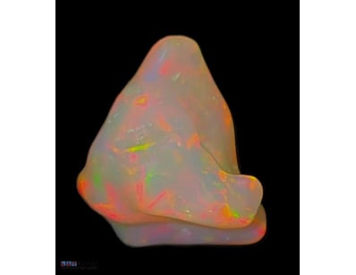 6 CARATS CARVED CRYSTAL OPAL.    

Dimensions: 15 ...