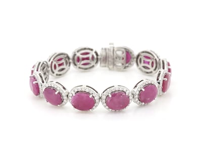 14K WHITE GOLD, RUBY AND DIAMOND, HALO BRACELET.  ...