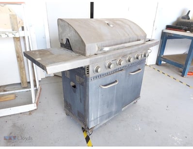 Jumbuck brand gas barbecue grill featuring a 6-bur...