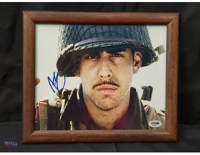A FRAMED, AUTOGRAPHED PHOTOGRAPH OF ACTOR ADAM GOL...