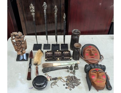 COLLECTION OF FOREIGN ARTIFACTS 

Includes Four ...