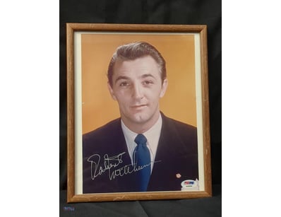 THIS FRAMED ITEM FEATURES A SIGNED PHOTOGRAPH OF T...