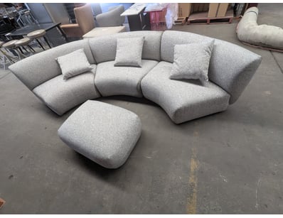 Contemporary modular sectional sofa featuring orga...
