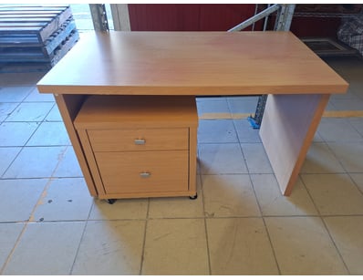 Timber office desk featuring a warm honey-toned fi...