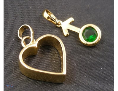 GOLD COLOUR PENDANTS        

Condition: Good - Re...