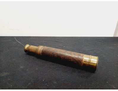 VINTAGE BRASS AND LEATHER TELESCOPE

Item Size: ...