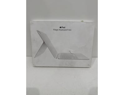 Apple iPad Magic Keyboard Folio in white. This is ...