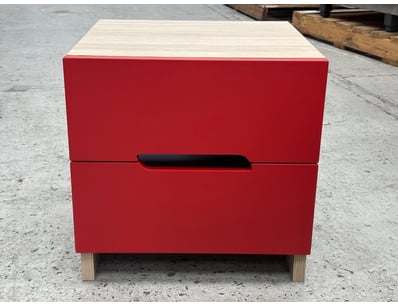 Modern two-drawer bedside table featuring a striki...