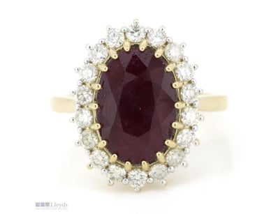 14K YELLOW GOLD, RUBY AND DIAMOND, HALO RING.     ...