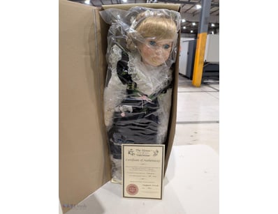 The House of Valentina heirloom porcelain doll fea...