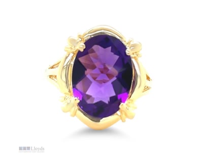 18CT YELLOW GOLD AMETHYST RING 6.7CT 5.67G     

T...