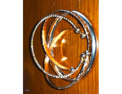 VARIETY OF GOLD PLATED BANGLES        

 0

583001...