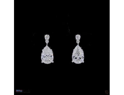 3.16 CT PEAR DROP STUD EARRINGS IN 18KT WHITE GOLD...