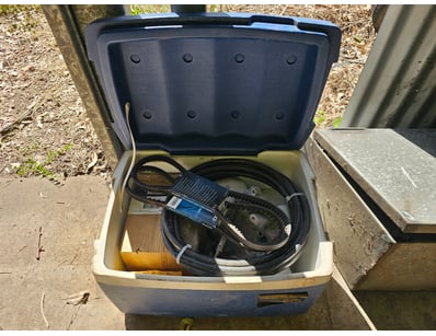 Esky plastic with assorted car parts, including fa...
