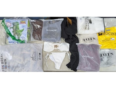 Collection of clothing items and inflatable toy st...