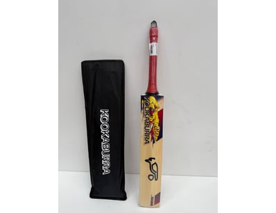 Kookaburra cricket bat featuring traditional woode...