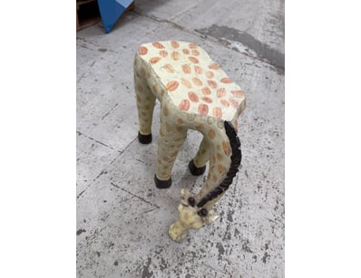 Decorative elephant stool or side table featuring ...