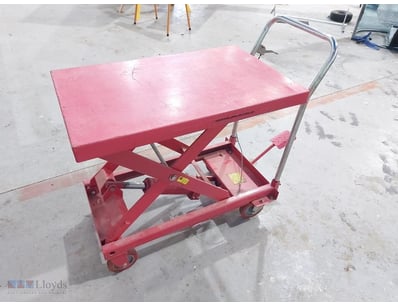Industrial hydraulic scissor lift table in vibrant...