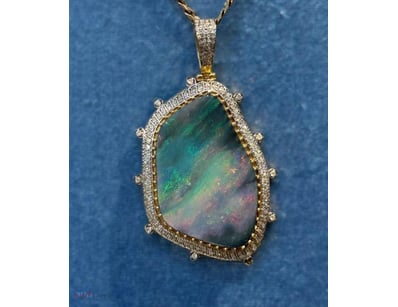 14K YELLOW GOLD 21.6CT QLD BOULDER OPAL AND 1.10CT...