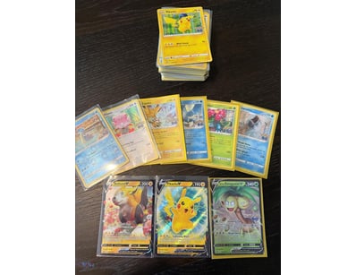 ASSORTED BULK POKÉMON CARDS INCLUDING HOLOS, V & M...