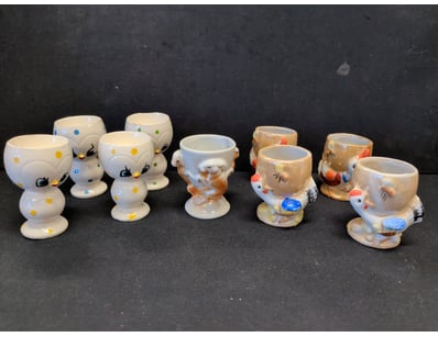 COLLECTION OF VINTAGE CERAMIC EGG CUPS WITH ANIMAL...