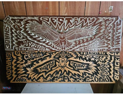Handcrafted wooden carving featuring an Eagle/Hawk...