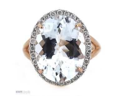 14K ROSE GOLD, AQUAMARINE AND DIAMOND, HALO RING. ...